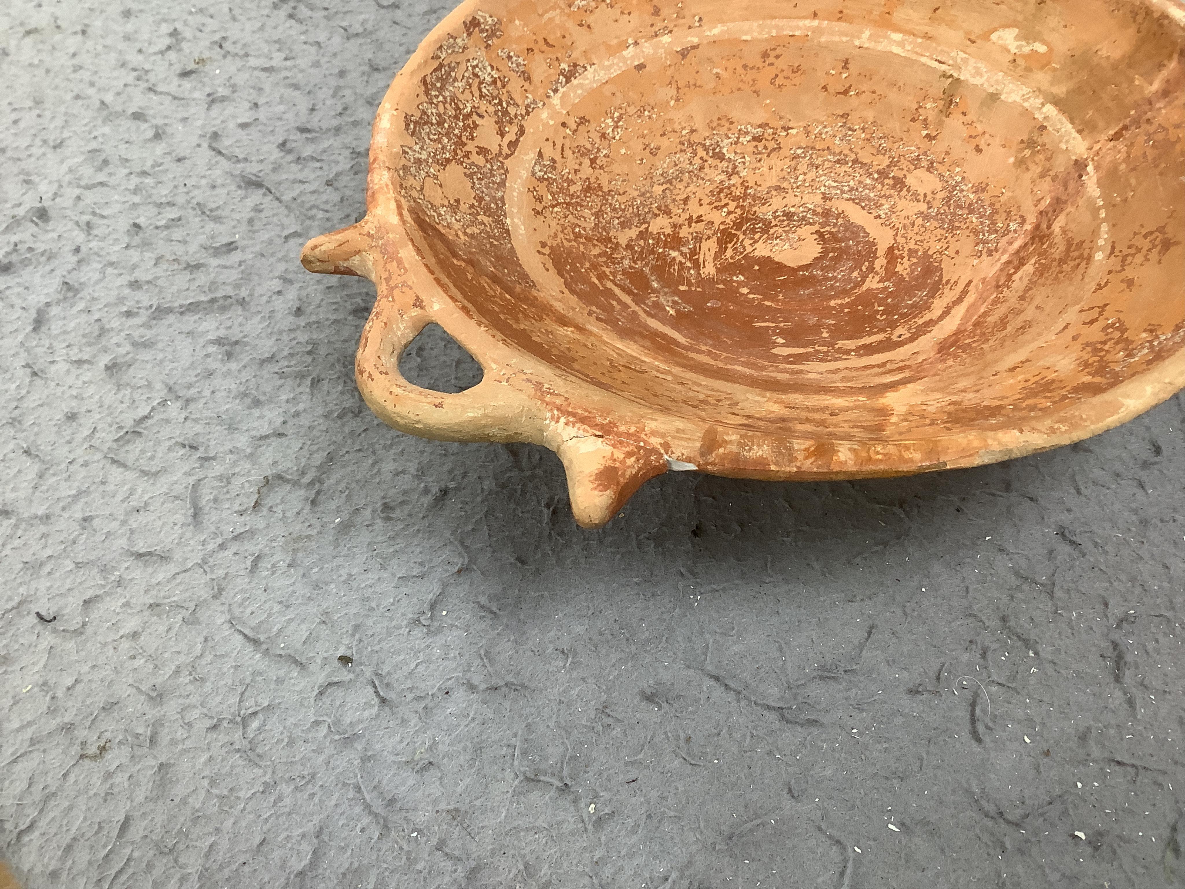 An Ancient Greek terracotta two-handled dish, circa 5th/4th century BC. Condition - good restored condition